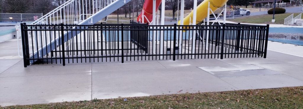 Photo of a fence surrounding a pool